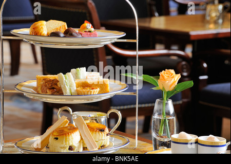 Traditional Afternoon tea in the lobby The Peninsula Hotel Hong Kong 5 star luxury hotel Afternoon tea Stock Photo