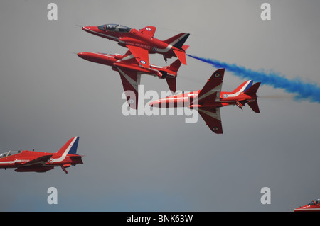 Red Arrows display team in flight at the Farnborough International Airshow 2010 Stock Photo
