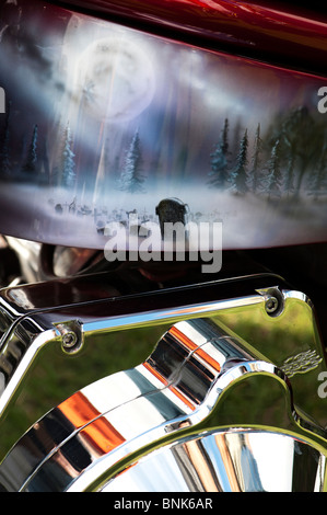 Airbrushed fantasy artwork of a ful moon on a graveyard scene painted on a Custom chopper Harley Davidson motorcycle Stock Photo