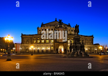 King John Memorial, in front of the Semperoper Opera House at night, Dresden, Saxony, Germany Stock Photo