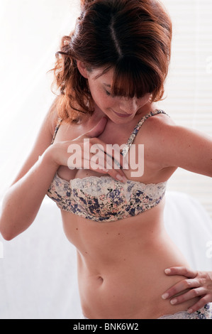 Young woman  with hand on hip Stock Photo