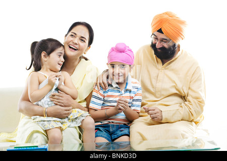 Grandparents spending time with their grand kids Stock Photo