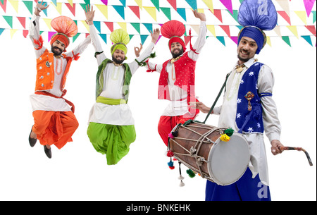 Sikh men jumping in the air Stock Photo