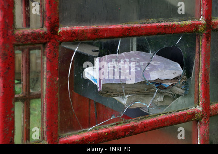 Phone book in derelict phone box, Kerrera, Scotland Stock Photo