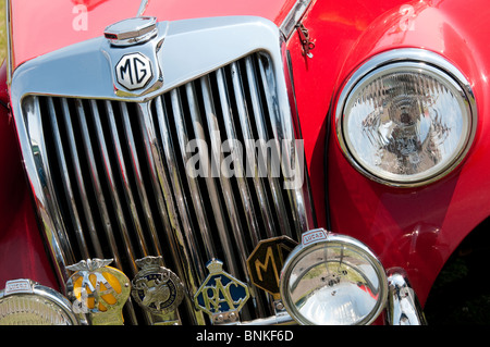 Radiator grille of a red MG sports car Stock Photo