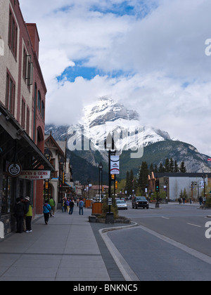 View of Banff Avenue with Cascade Mountain in the background. Downtown Banff Alberta Canada Stock Photo