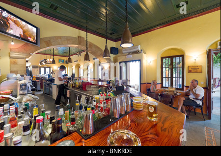 Interior of Alexi's Bar in the village centre of Lindos, Rhodes, Greece Stock Photo