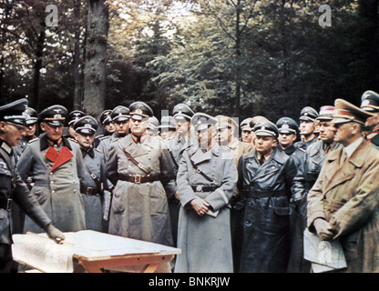 HEINRICH HIMMLER (centre wearing glasses) in Austria in 1939 with Hitler at right and Reinhard Heydrich fourth from right Stock Photo