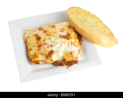 Portion of Lasagne with Garlic Bread Stock Photo