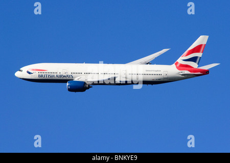 Boeing 777 operated by British Airways in flight after departure from London Heathrow Airport, UK. Stock Photo