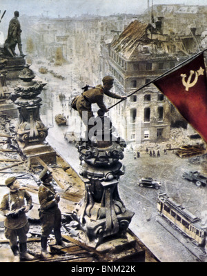 RUSSIANS RAISE FLAG OVER BRANDENBURG GATE, April 1945. A colourised version of one of the most famous images of WW2 Stock Photo