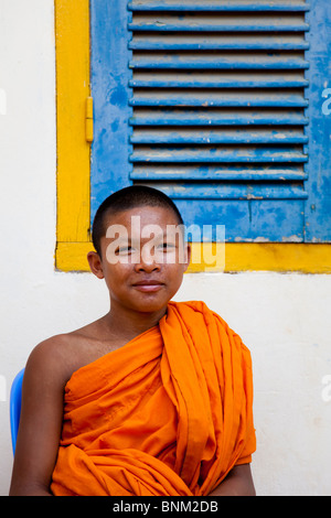 Portrait of a young, smiling novice monk in Cambodia - Kandal Province, Cambodia Stock Photo