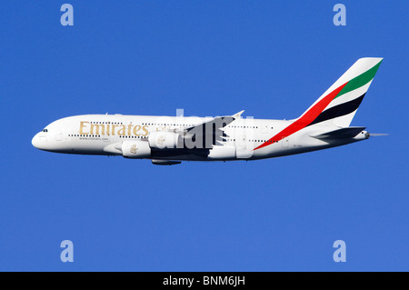 Emirates A380 Airbus plane in flight after departure from London Heathrow Airport, UK, bound for Dubai. Stock Photo