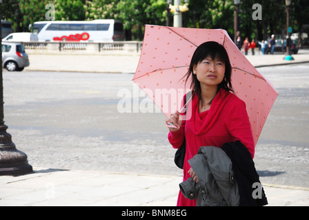 Asian tourist at Place de la Concorde, 8th Arr. Paris France Europe Stock Photo