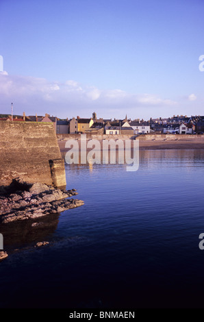 Eyemouth harbour wall and beach. Scotland. Tourist destination. Clear water and blue skies in Scotland. Stock Photo