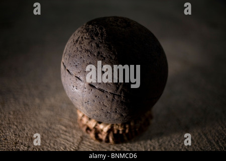 A ball is displayed before a Mayan Ball Game match, known as Pok Ta Pok, in Chapab, Yucatan Peninsula, Mexico, June 13, 2009. Stock Photo