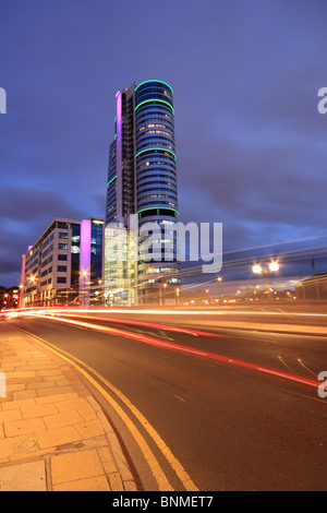 Traffic trails next to Bridgewater Place, one of the tallest buildings in Leeds, West Yorkshire, England Stock Photo