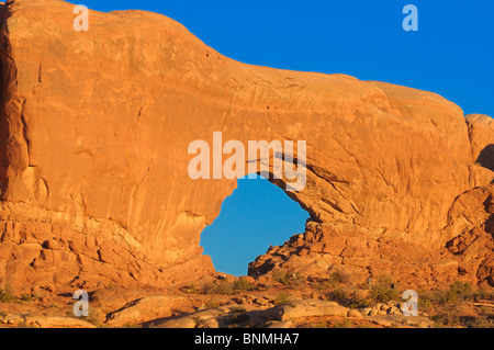 Arch Windows Section Red Rocks sunlight blue sky rock formations Nature Landscape Arches National Park National Park near Moab Stock Photo