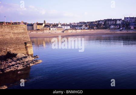 Eyemouth harbour wall and beach. Scotland. Tourist destination. Clear water and blue skies in Scotland. Stock Photo