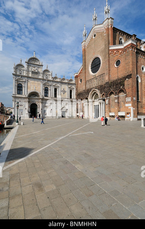 Venice. Italy. Campo Santi Giovanni e Paolo, Scuola Grande di San Marco (Left) the church of Santi Giovanni e Paolo (Right). Stock Photo