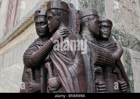 Venice. Italy. 4th C porphyry sculpture Portrait of the Four Tetrarchs on the exterior of St Marks Basilica. Stock Photo