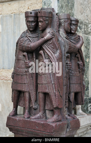 Venice. Italy. 4th C porphyry sculpture of the Tetrarchs on the exterior of St Marks Basilica. Stock Photo