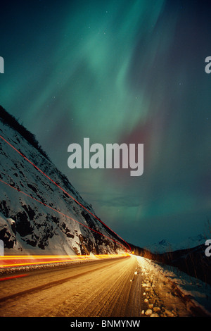 Streaked Truck Lights on Glenn Hwy w/N.Lights AK SC Winter Stock Photo