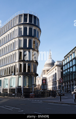 The corner of 30 Cannon Street with the dome of St.Paul's Cathedral in the background Stock Photo