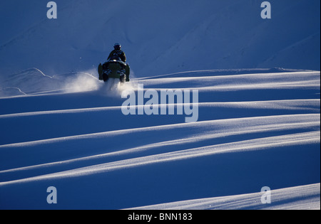 Man on Snowmachine at Turnagain Pass KP Alaska
