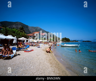 Beach scene at the picturesque resort of Nidri on the Greek island of Lefkas Stock Photo