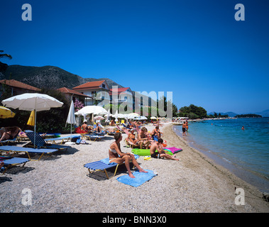 Beach scene at the picturesque resort of Nidri on the Greek island of Lefkas Stock Photo