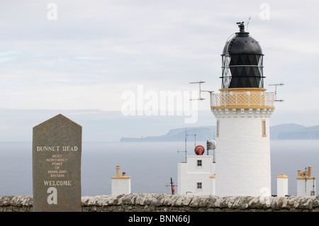 The lighthouse at Dunnet Head, Scotland, with Orkney in the distance. The most northerly place on the British mainland. Stock Photo