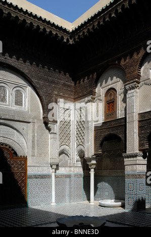 Interior Court or Courtyard of the Attarine Medersa (1323-25) or Medresse, aka Al-Attarine Madrasa or Koranic School, Medina, Fez, Morocco Stock Photo
