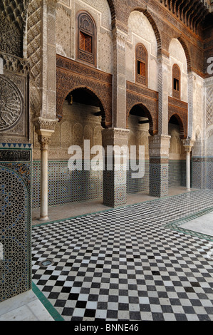 Interior Tiled Court or Courtyard of the Attarine Medersa (1323-25) or Medresse (Koranic School) aka Al-Attarine Madrasa, Medina, Fez, Morocco Stock Photo