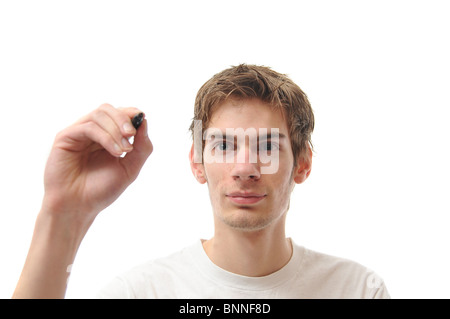 Young Male Student Writing On Empty Whiteboard isolated on white background Stock Photo