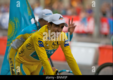 Yellow jersey winner, Alberto Contador, rides a victory lap of the Champs Elysees in Paris, during the 2010 Tour de France Stock Photo