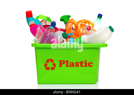 Photo of a green plastic recycling bin isolated on a white background. Stock Photo