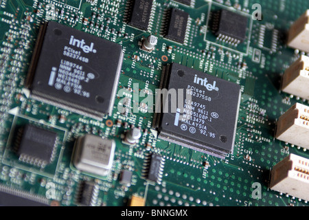 Two Intel PCI CPU controllers on a Dell computer system board Stock Photo