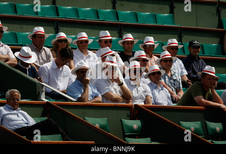 Group of spectators with Panama hats in the VIP Box  at the French Open 2010, Roland Garros, Paris, Stock Photo