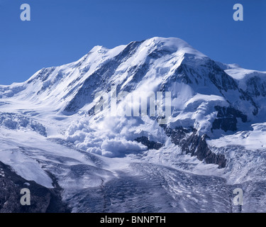 Lyskamm VS avalanche physical power canton Valais snow winter mountain mountains scenery Switzerland Stock Photo