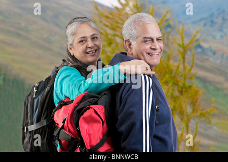 Portrait of old couple with hiking gear Stock Photo