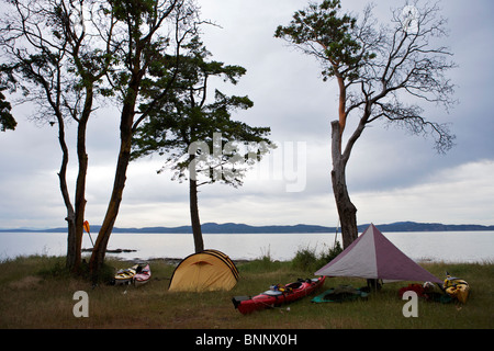 Kayak camping on Portland Island near Sidney, Vancouver Island ö BC Canada Stock Photo