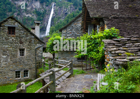 Foroglio Switzerland canton Ticino Bavonatal village houses homes stone houses shoots waterfall Stock Photo