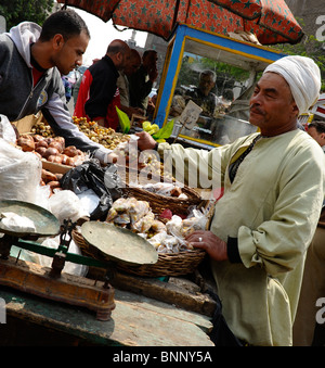 street vendor at the friday bird market, side street by the   the Al-Tonssy flyover ,near the citadel, cairo, egypt Stock Photo
