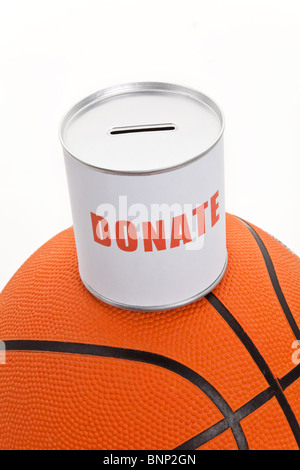 Donation Box and Basketball, concept of sport funds Stock Photo