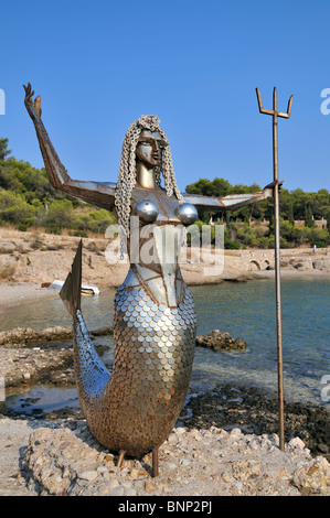 Metal mermaid at Faros area, old port, Spetses town, Spetses island, Greece Stock Photo