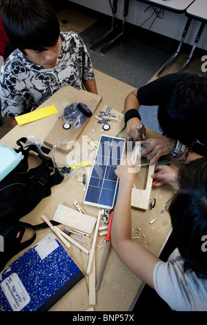 Students work on model solar car in engineering class at Manor New Tech High School in Manor, Texas Stock Photo