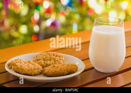 Milk and Cookies set out for Santa Claus on Christmas Eve. Stock Photo