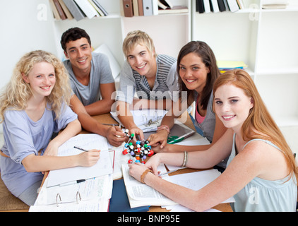 High angle of teenagers studying Science in a library Stock Photo
