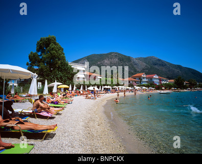 Beach scene at the picturesque resort of Nidri on the Greek island of Lefkas Stock Photo